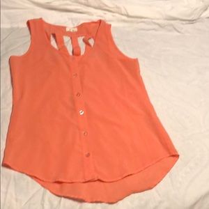 Coral tank with cutout back